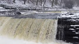 Amazing footage from the Yorkshire Dales as raging waterfalls are set to a freezing backdrop of falling snow