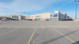 Massive shopping mall and parking lots completely empty as Toronto Ontario area COVID lockdown continues to keep stores and businesses closed and thousands unemployed in Canada