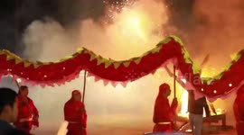 Chinese town celebrates Lunar New Year with spectacular fire dragon dance