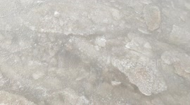 Incredibly rare footage as sea starts to freeze along the NW coast of England as deep freeze continues across the UK