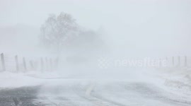 Whiteout snow and blizzard causes dangerous driving conditions in Northern Ireland