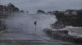 Joggers Struck by Large Wave