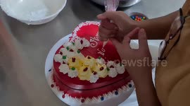 Sales of Valentine's Day heart-shaped cakes fund schooling for Filipino children