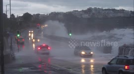 Waves crash over sea wall in Torbay in Devon as severe winter weather continues