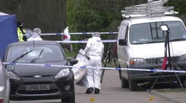 Police forensic teams on site at the scene of a fatal stabbing in Caversham, Berkshire