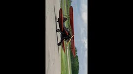 Bi-plane taxing on the runway at the aviation museum in Ottawa