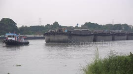 A barge on a river in Thailand.
