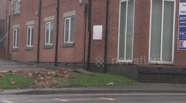 Road closed as bricks fall from roof in Derbyshire