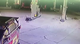 Out-of-control truck hits lorry then crashes into petrol station forecourt