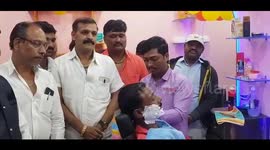 Saloon owner in India uses a unique gold razor for shaving and hair cutting