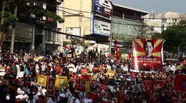 Protestors gathered outside the National League of Democracy headquarters after the military raid the headquarters in Myanmar