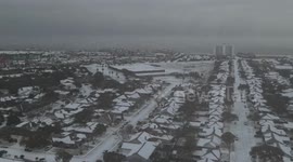 Drone footage captures Galveston, Texas covered in snow after winter storm