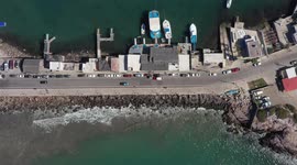 Aerial view of the maritime port, jetty and boats in the sea water in the bay on the stone island in Mazatlan, Sinaloa Mexico. 2021 in Mazatlan, Mexico.