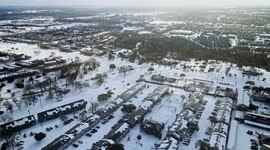 Aerial shots capture scale of snow in College Station, Texas