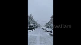 Athens receives rare blanket of snow during cold snap
