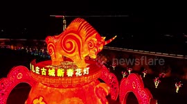Hundreds of lanterns illuminate historical city during Chinese New Year holidays