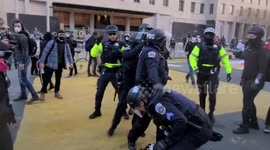 Police retreating out of black lives matter plaza using pepper spray and make arrests.