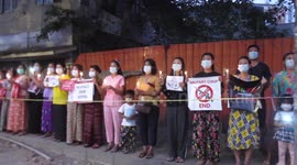 Residents line streets in Myanmar during vigil for protester who was shot dead