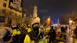 Armor God individuals in camo on black lives matter plaza January 5th