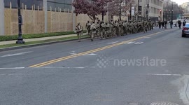 National guard marching through Washington DC just hours after Joe Biden inauguration.