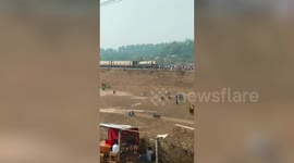 Burmese villagers hold up train in protest against military coup in Myanmar