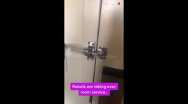 Hotel Guest Surprised after Seeing a Robot doing Room Service