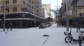 Snow blankets streets of San Antonio, Texas, as sub-freezing temperatures continue to grip the region