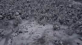 Drone footage shows Greek capital blanketed by snow