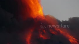 Stunning fountain of lava of Etna volcano Sicily