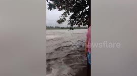 Flash flood swamp village after heavy rain in the Philippines