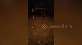 Ghost park swing moves by itself as others remain still