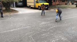 Hilarious moment Texas sons play ice hockey on frozen street