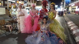 Ladyboys show off at Chiang Mai night bazaar in Thailand