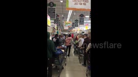 Texans wait in long lines for groceries amid preparations for subfreezing temperatures