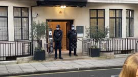 Officers stand guard as Prince Philip spends second night in hospital