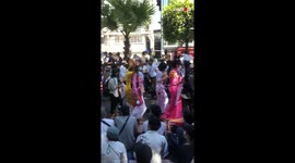 Citizens of Myanmar Dressed in a Traditional Costume Continue to Protest for Release of their Leader