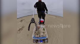 US man uses remote-controlled 'litterbuggie' to clear up trash on Texas beaches