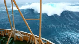 Monster waves smash against windows of North Sea rig
