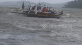 Tropical storm Auring causes choppy seas as it moves towards the Philippines