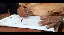 Life Show Of Caligraphy In Streets