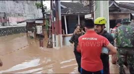 Baby Avacuation Trapped in Flood in Jati Ashi Bekasi, West Java, Indonesia