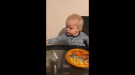 Toddler steals his brothers burger
