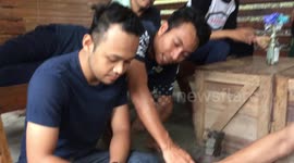 Playing Congkak
