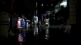 Flooding continues through the night in Jakarta