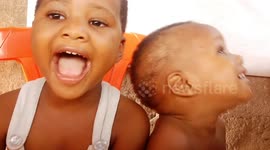 Toddlers sees themselves on camera for the first time