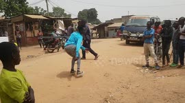 Talented and charismatic street dancer entertains the crowd in Kampala, Uganda