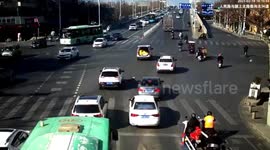Chinese child falls out of moving minibus on busy road after opening trunk door
