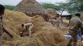 Officials seize alcohol hidden under haystack in southern India
