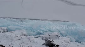 Large shards of blue ice wash up on Lake Superior's shore in Minnesota