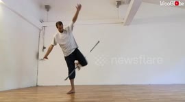 French Italian Circus Artist Performing Contact Staff Flow
